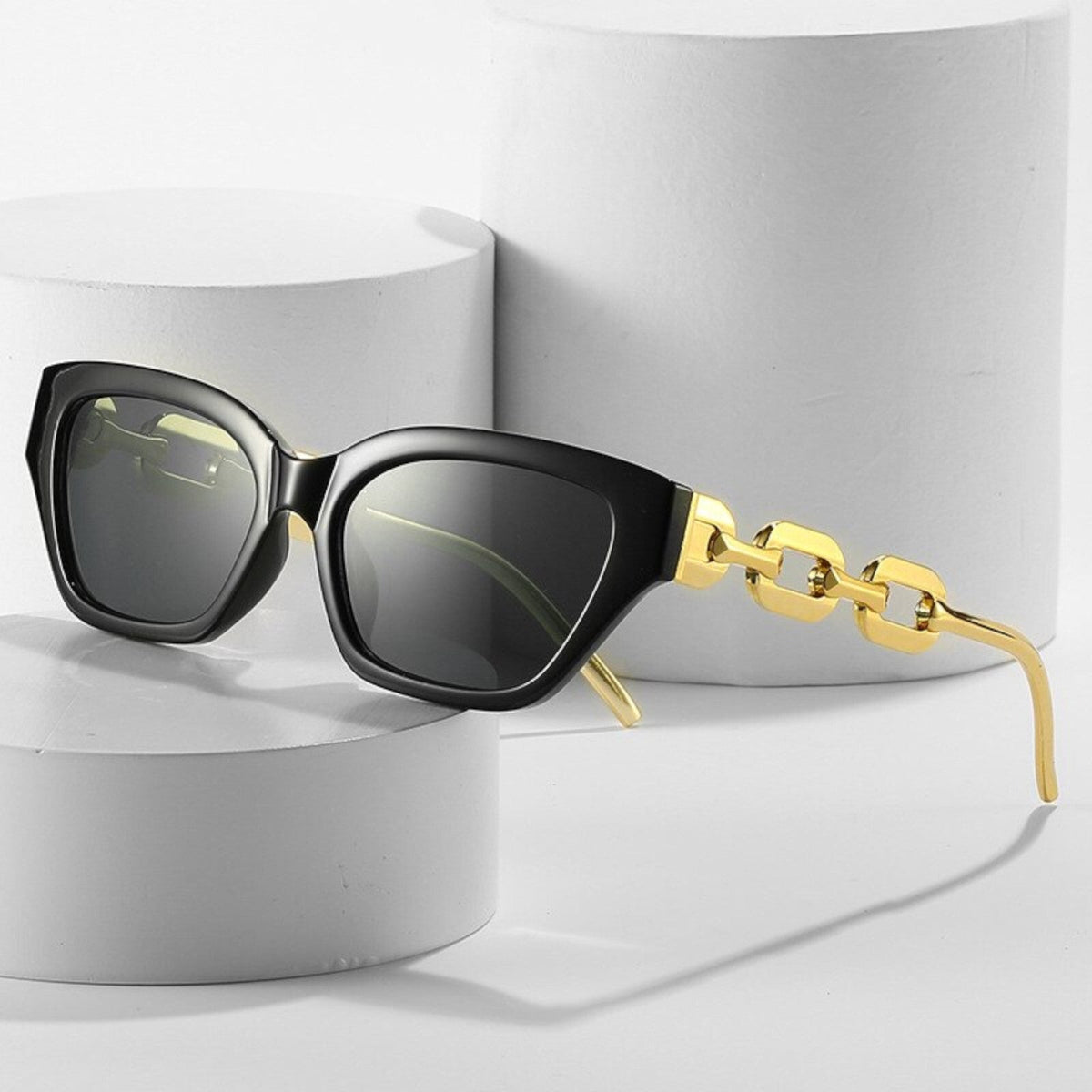 Schwarz-goldene Vintage Cat-Eye-Sonnenbrille