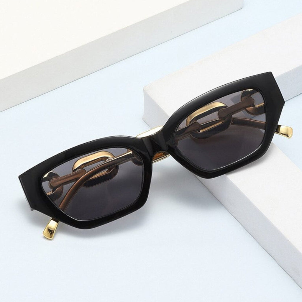 Schwarz-goldene Vintage Cat-Eye-Sonnenbrille