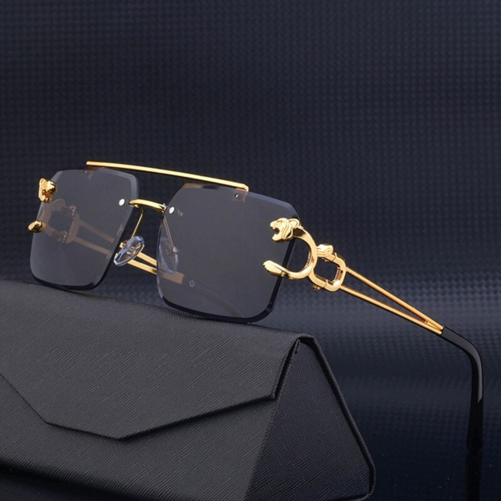 Schwarz-goldene Vintage Designer-Sonnenbrille