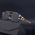 Schwarz-goldene Vintage Designer-Sonnenbrille