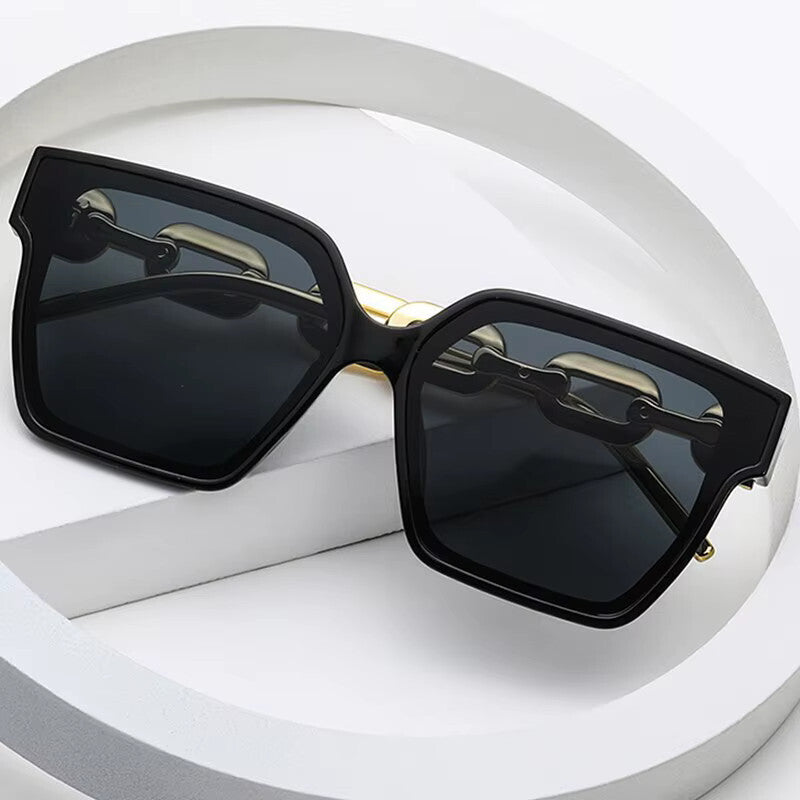 Oversized Cat-Eye-Sonnenbrille Schwarz-Gold