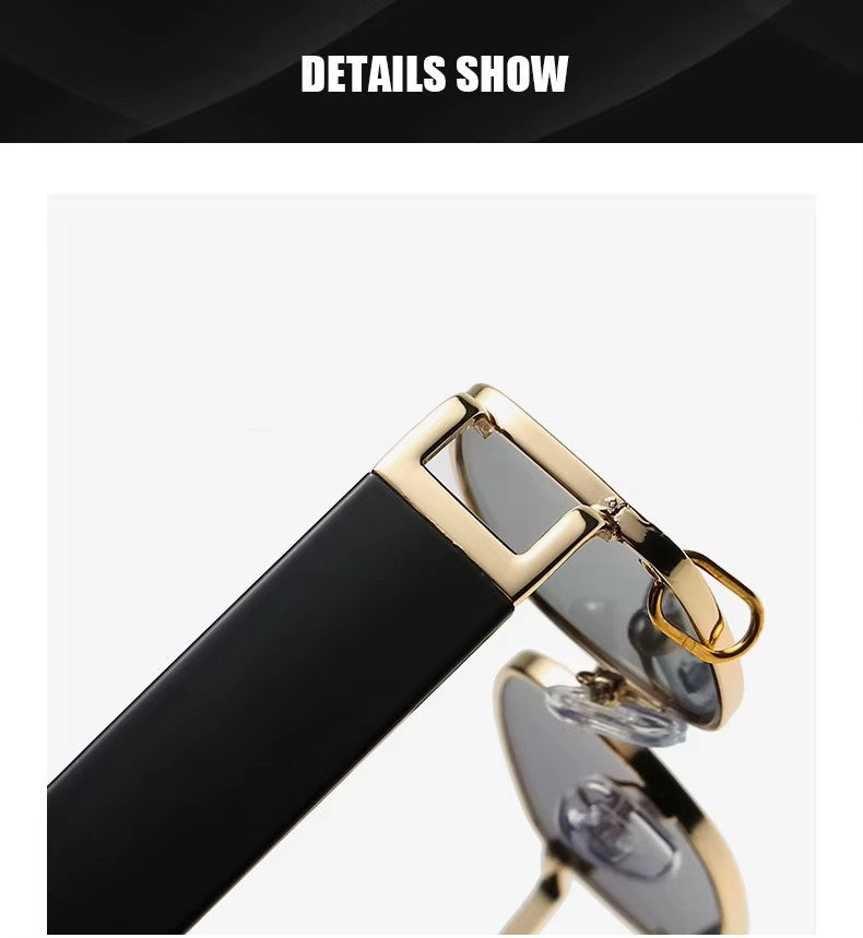 Schwarz-goldene Designer-Sonnenbrille mit Ring im Glas