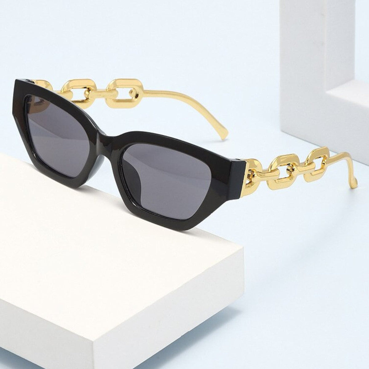 Schwarz-goldene Vintage Cat-Eye-Sonnenbrille