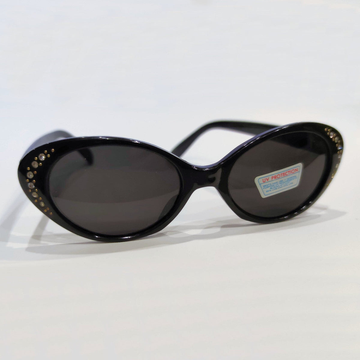 Schwarze Cat-Eye-Sonnenbrille mit Strass