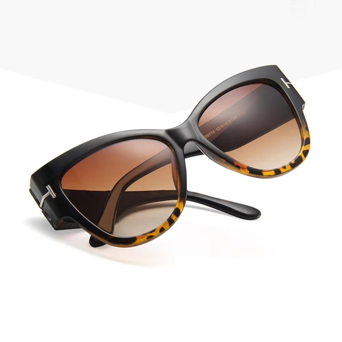 Oversized Cat-Eye-Sonnenbrille in Schwarz-Leopard mit braunen Gläsern