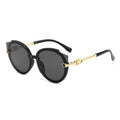 Oversized Cat-Eye-Sonnenbrille Schwarz-Gold