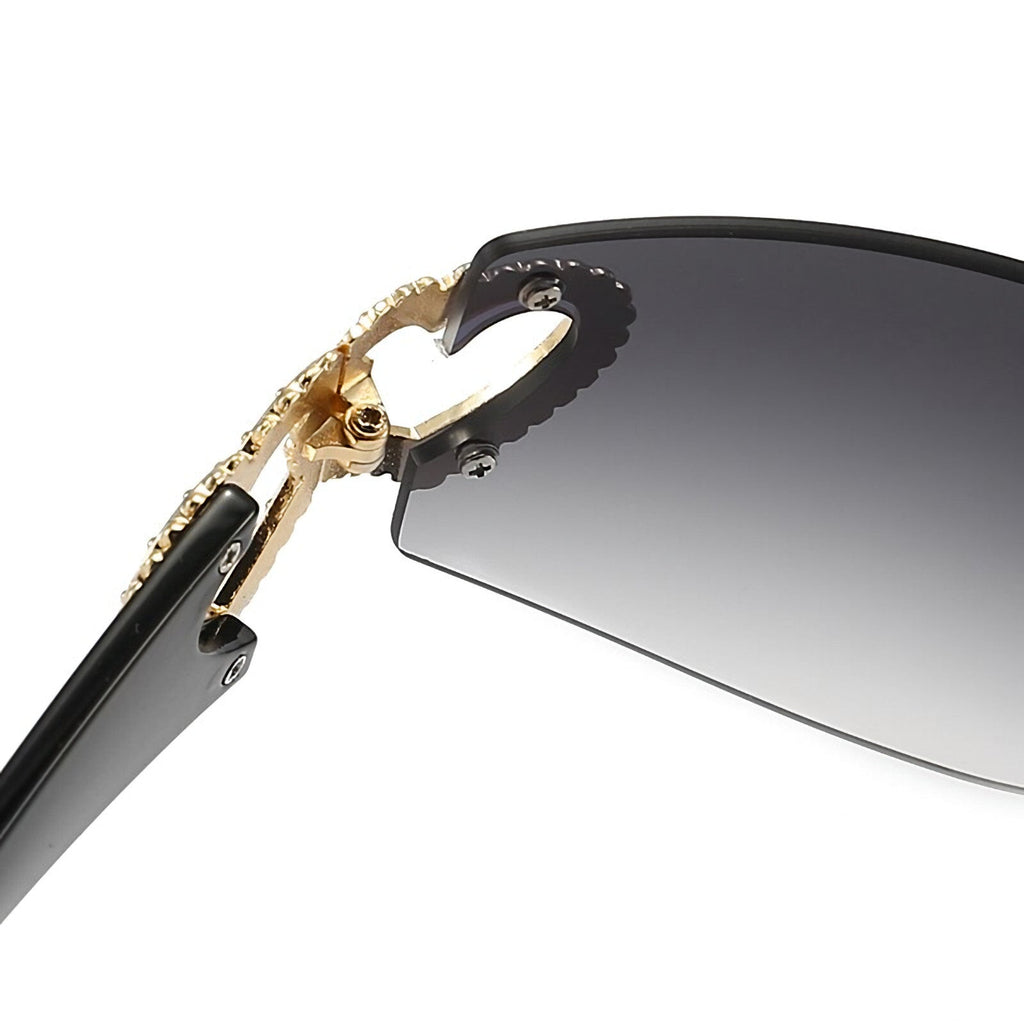 Schwarz-goldene Designer-Sonnenbrille mit Herzen