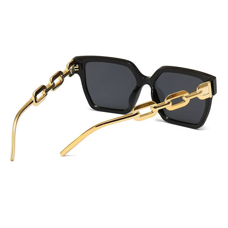 Oversized Cat-Eye-Sonnenbrille Schwarz-Gold