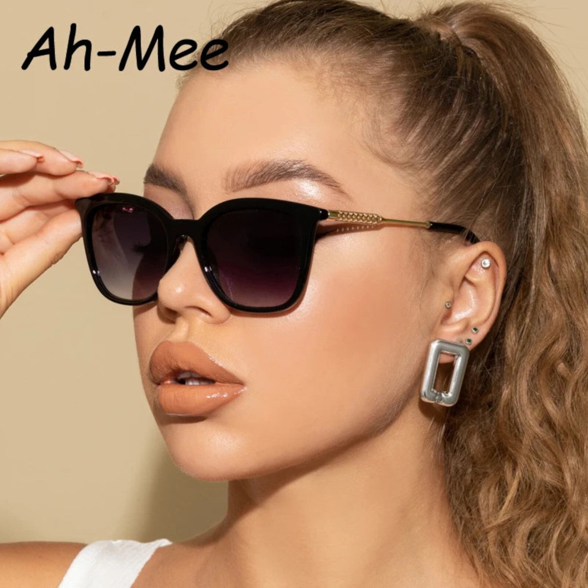 Oversized Cat-Eye-Sonnenbrille Schwarz-Gold
