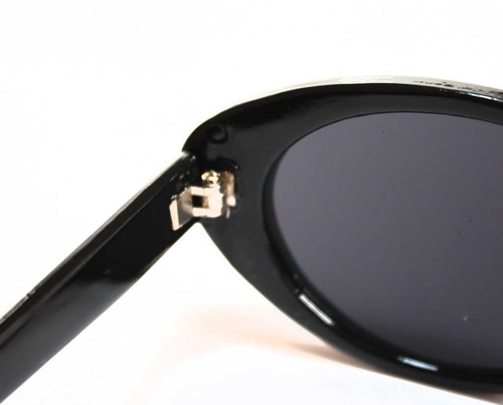 Schwarze Cat-Eye-Sonnenbrille mit Strass