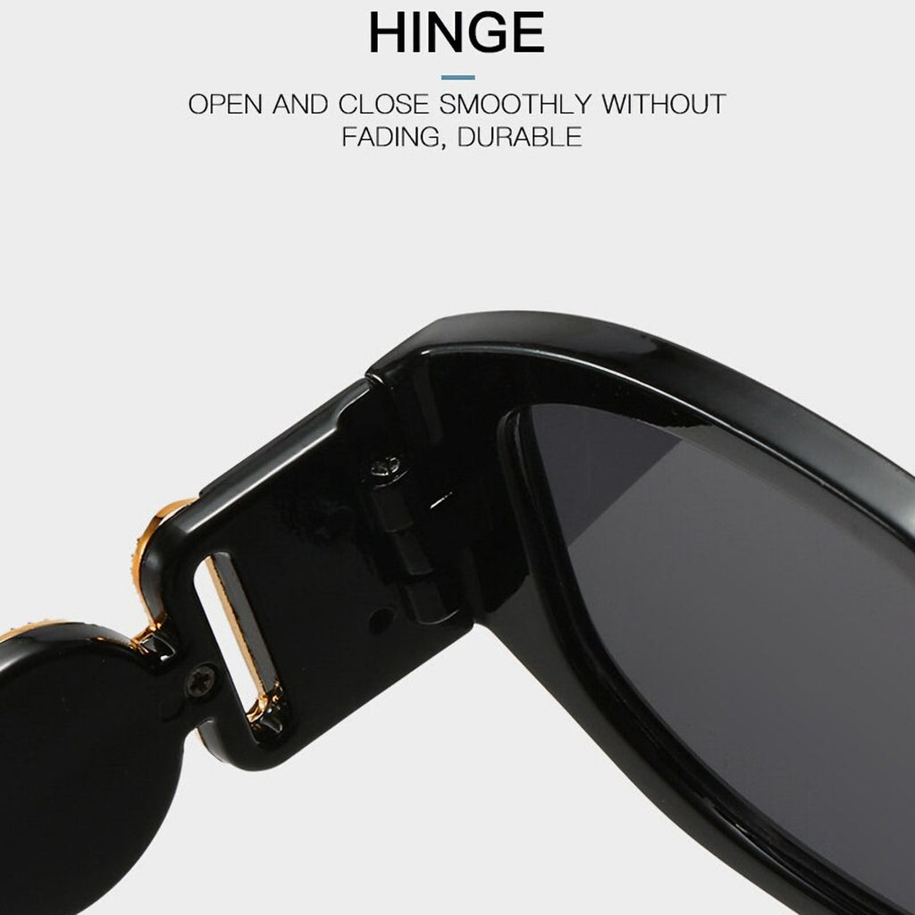 Schwarze Vintage Sonnenbrille mit goldenen Applikationen