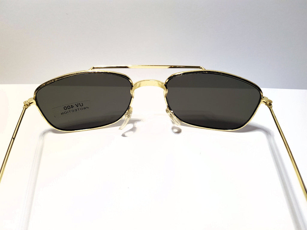 Gold-schwarze Piloten-Sonnenbrille im Porsche-Stil