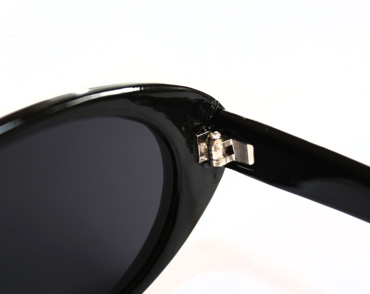 Schwarze Cat-Eye-Sonnenbrille mit Strass