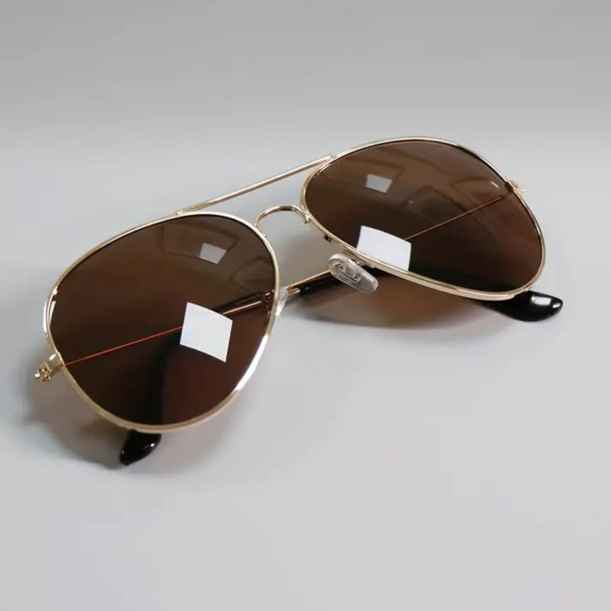 Gold-braune Piloten-Sonnenbrille
