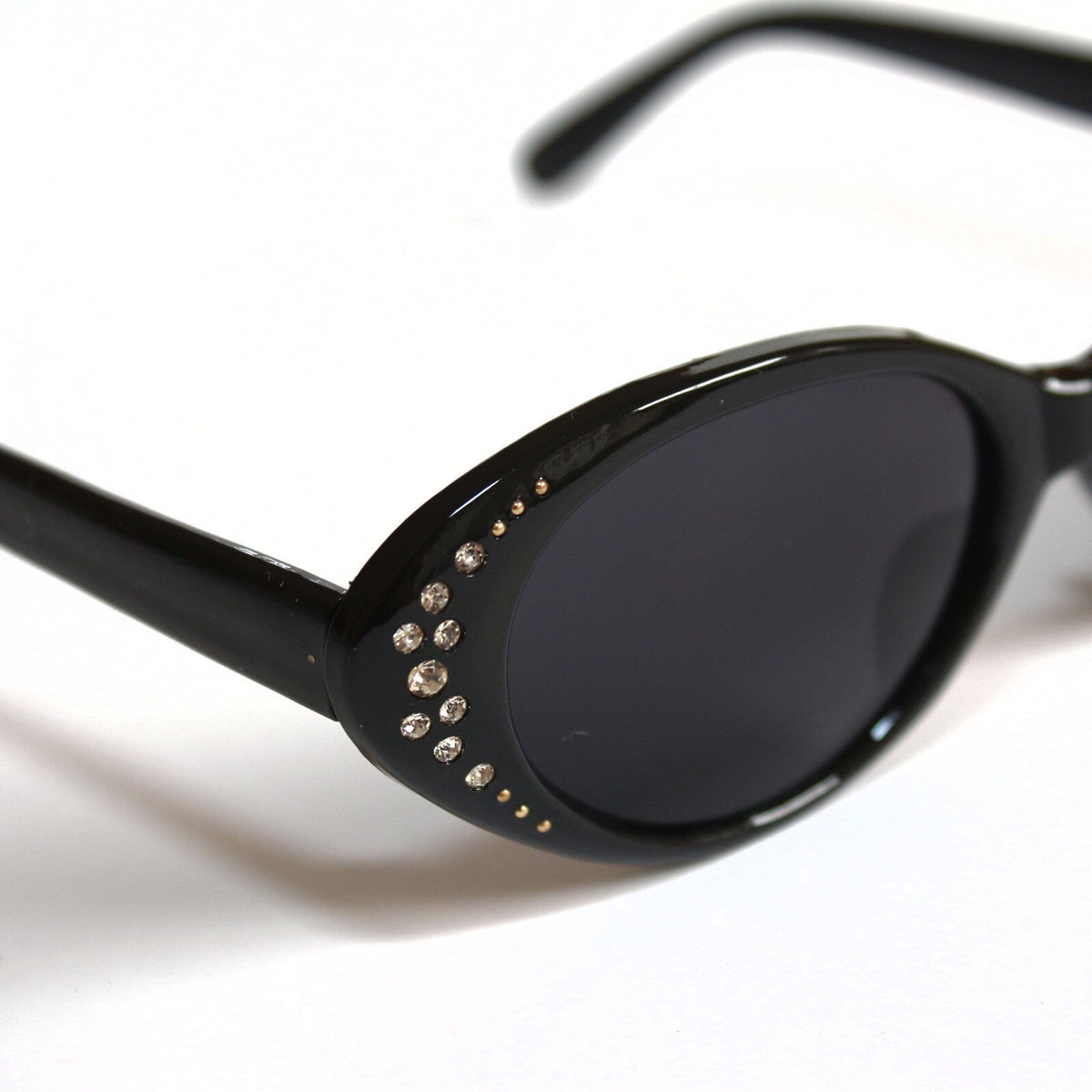 Schwarze Cat-Eye-Sonnenbrille mit Strass