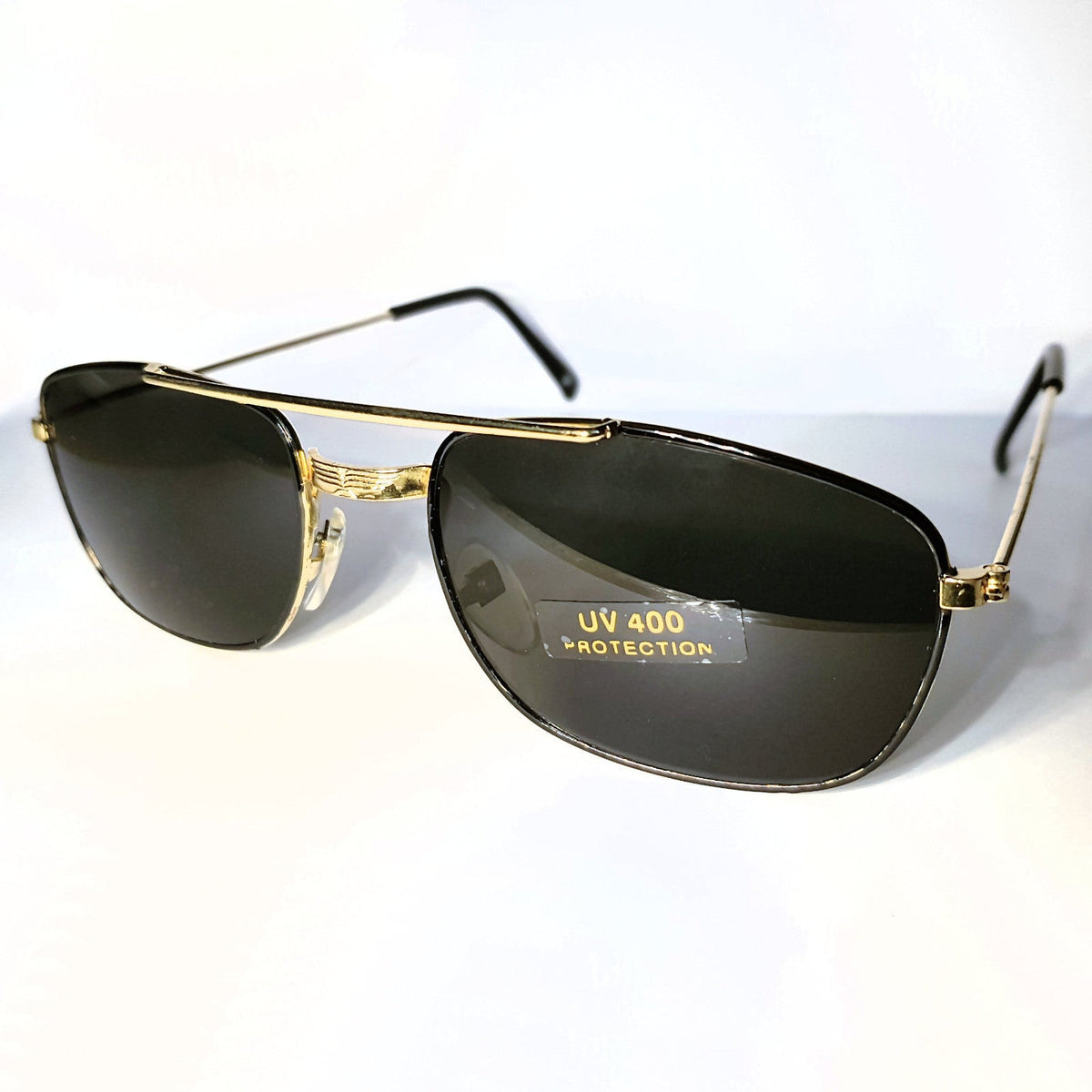 Gold-schwarze Piloten-Sonnenbrille im Porsche-Stil