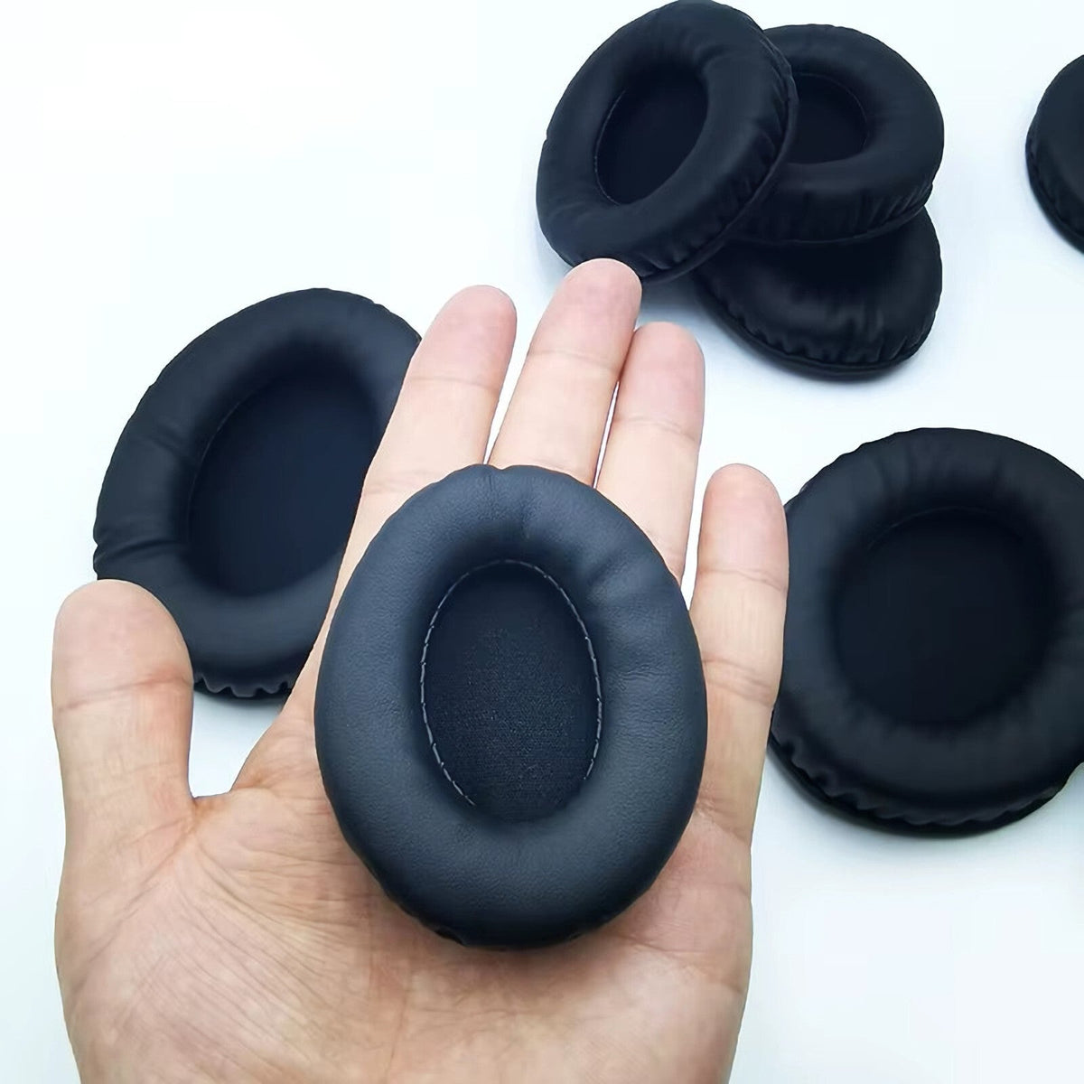 Ovale schwarze Memory-Foam Ohrpolster in verschiedenen Größen